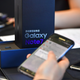 A man checks his Samsung Galaxy Note7 smartphone at a telecommunications shop in Seoul, Korea, on Sept. 19, 2016.
JUNG YEON-JE/AFP/Getty Images
